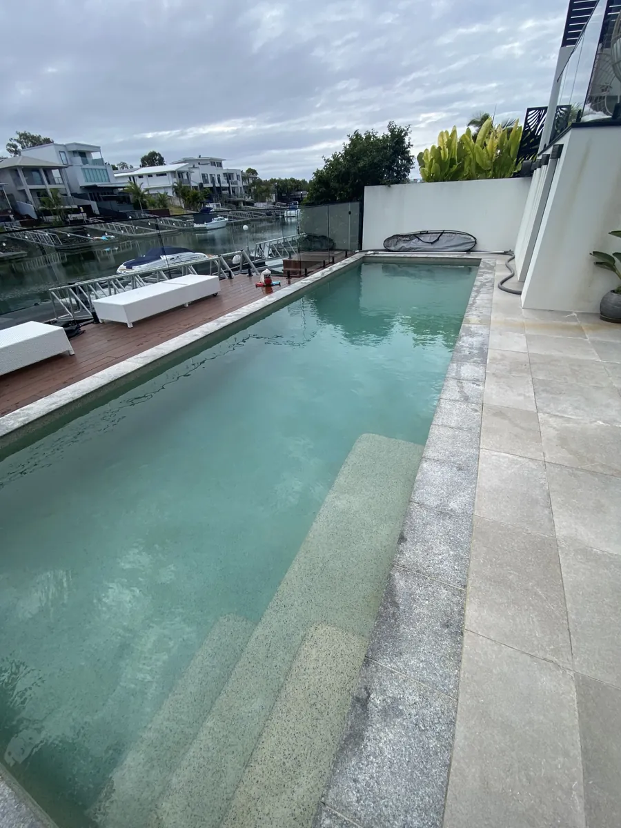 Waterfront lap pool kept clear by Deep Blue