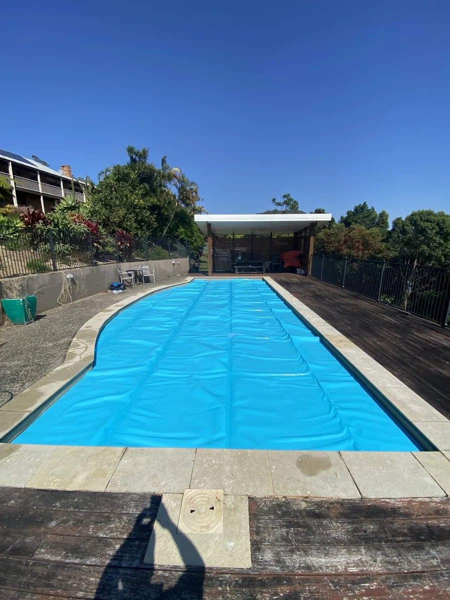 Pool with cover maintained by Deep Blue