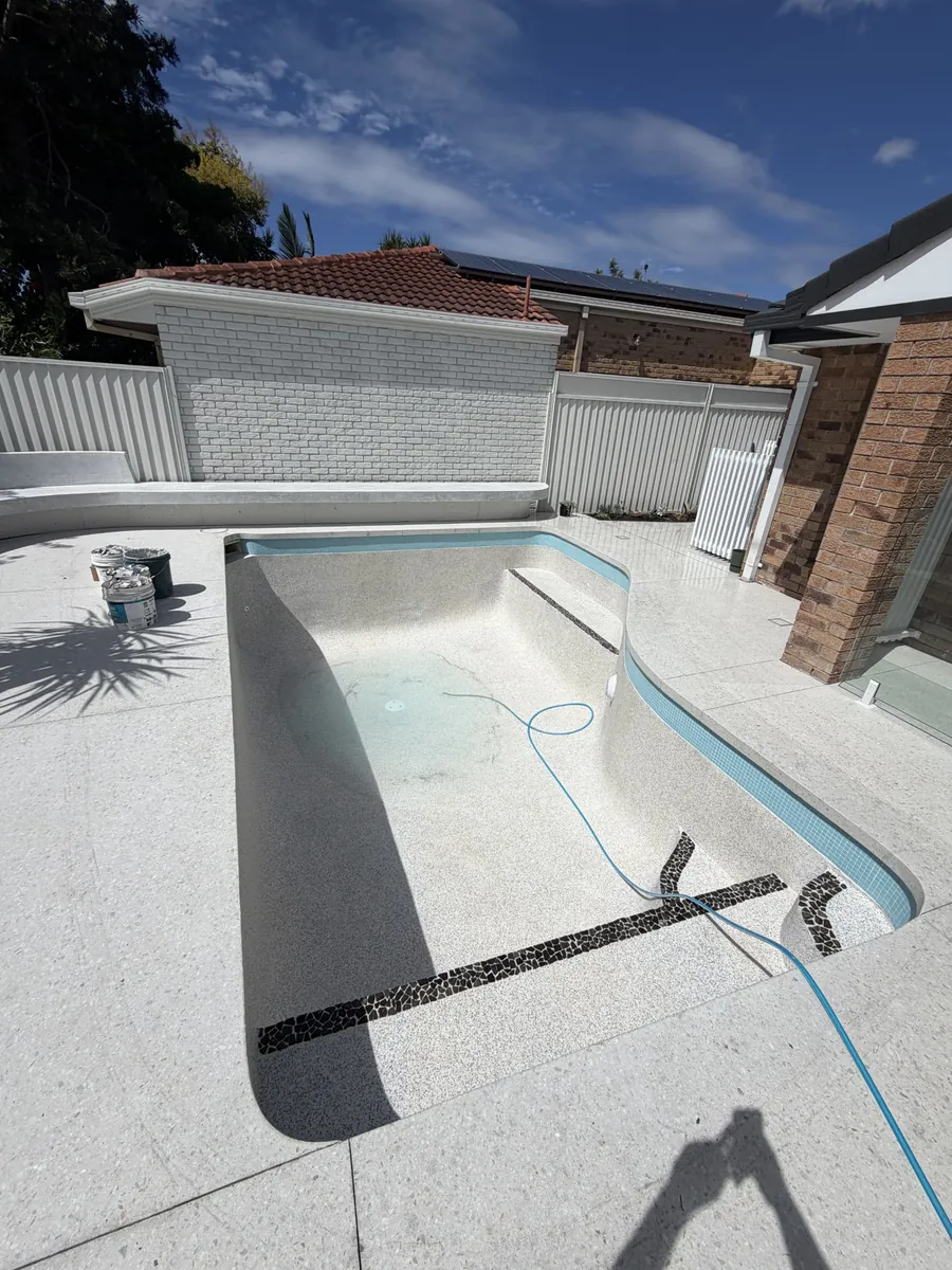 Pool deck and clean water by Deep Blue