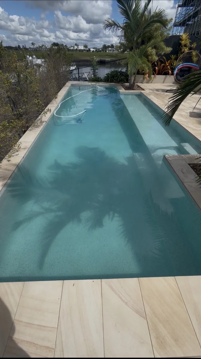 Pool and deck serviced by Deep Blue